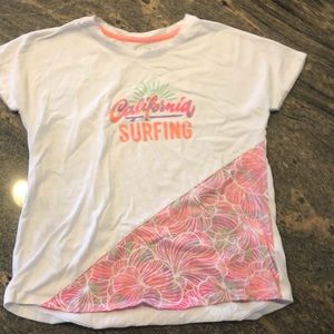 White orange and pink kids surfing shirt